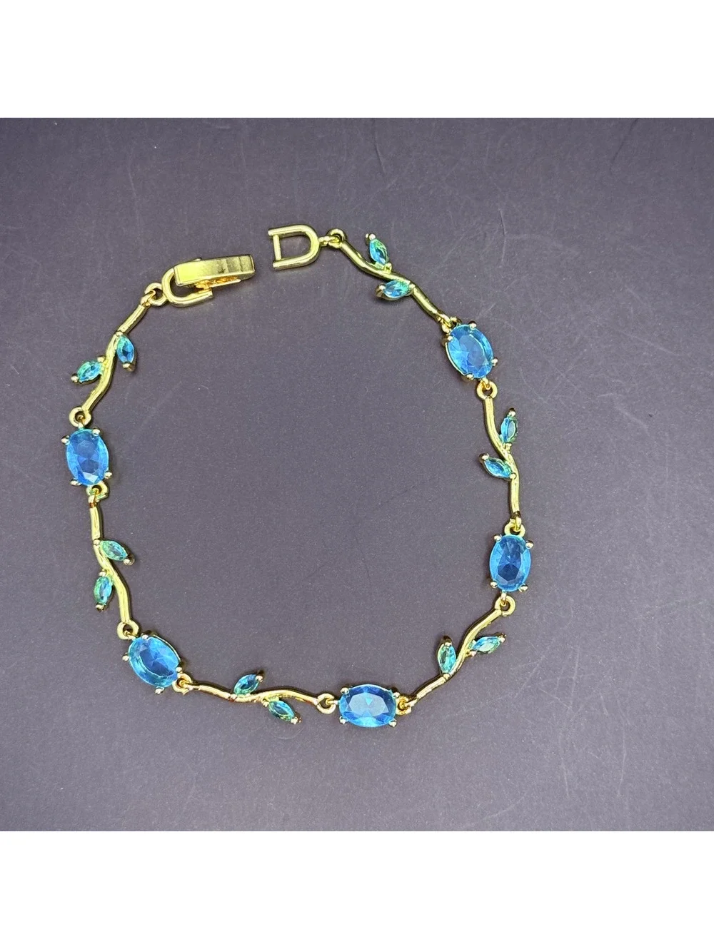 candy+clover aqua tulip vine gold tone bracelet